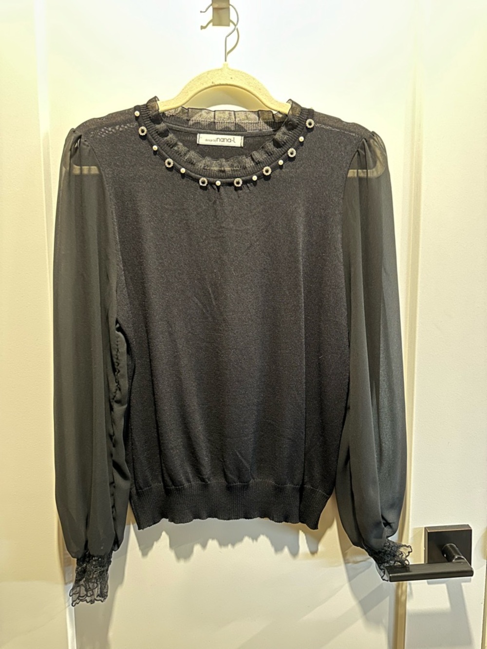 NaNa Black Long-Sleeve Knit Top with Sheer Sleeves and Embellished Neckline